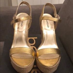 BEBE GOLD WEDGES